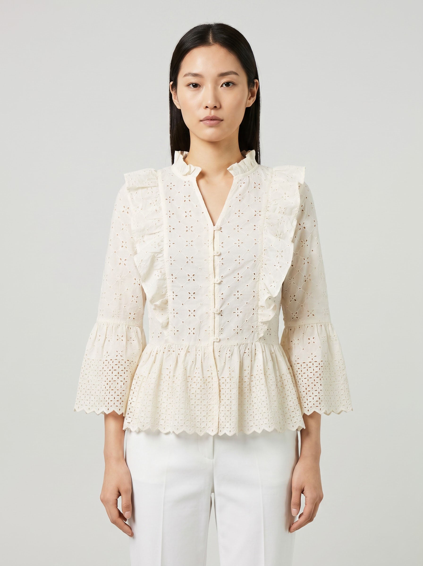 Women Cream Schiffli Embroidered Peplum Top with Ruffle Detail