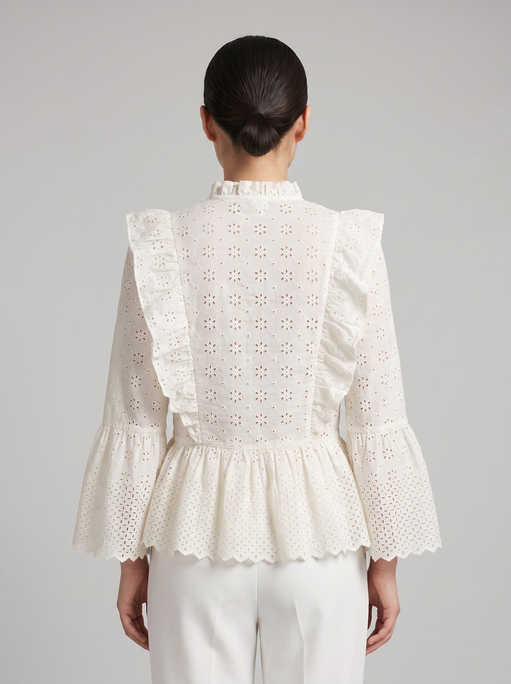 Women Cream Schiffli Embroidered Peplum Top with Ruffle Detail