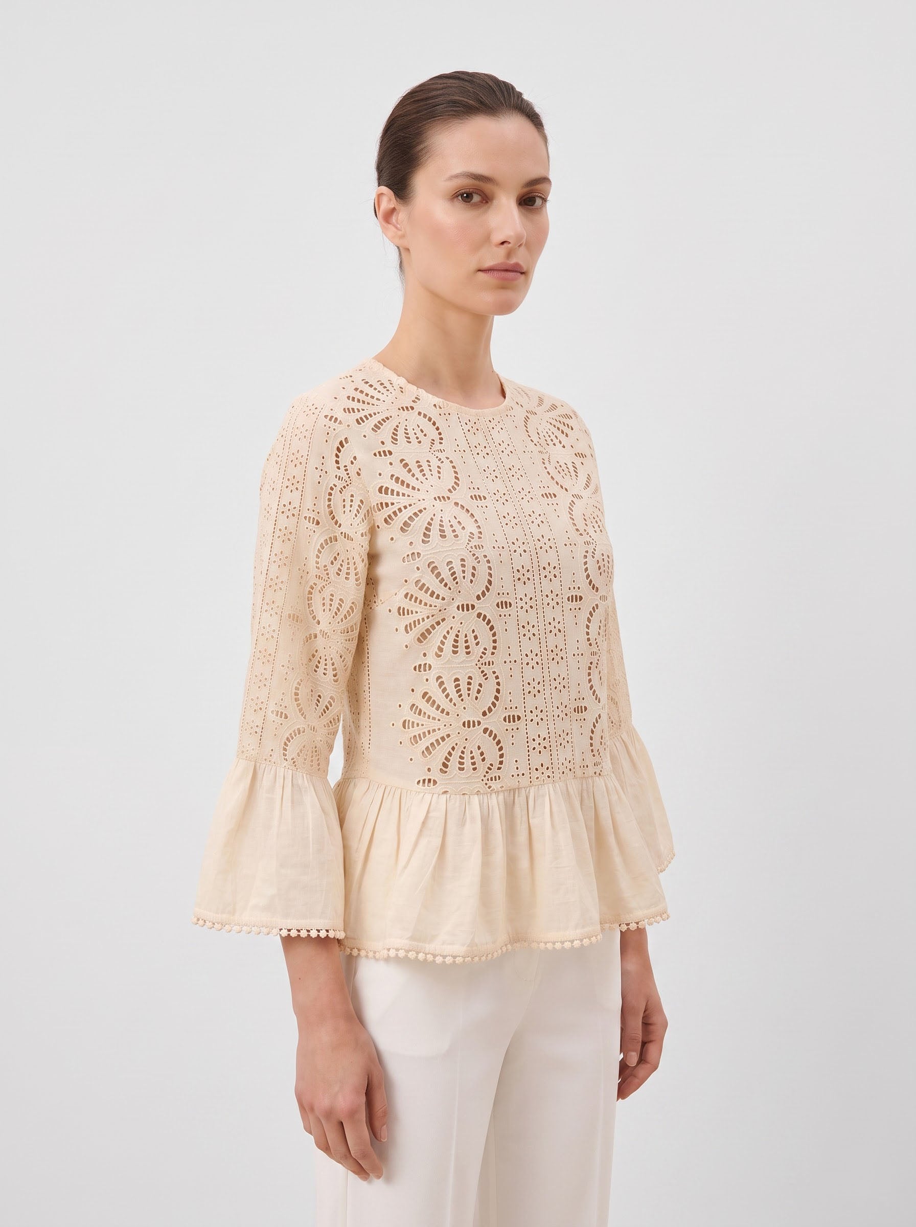 Women Beige Schiffli Embroidered Peplum Top with Flared Sleeves