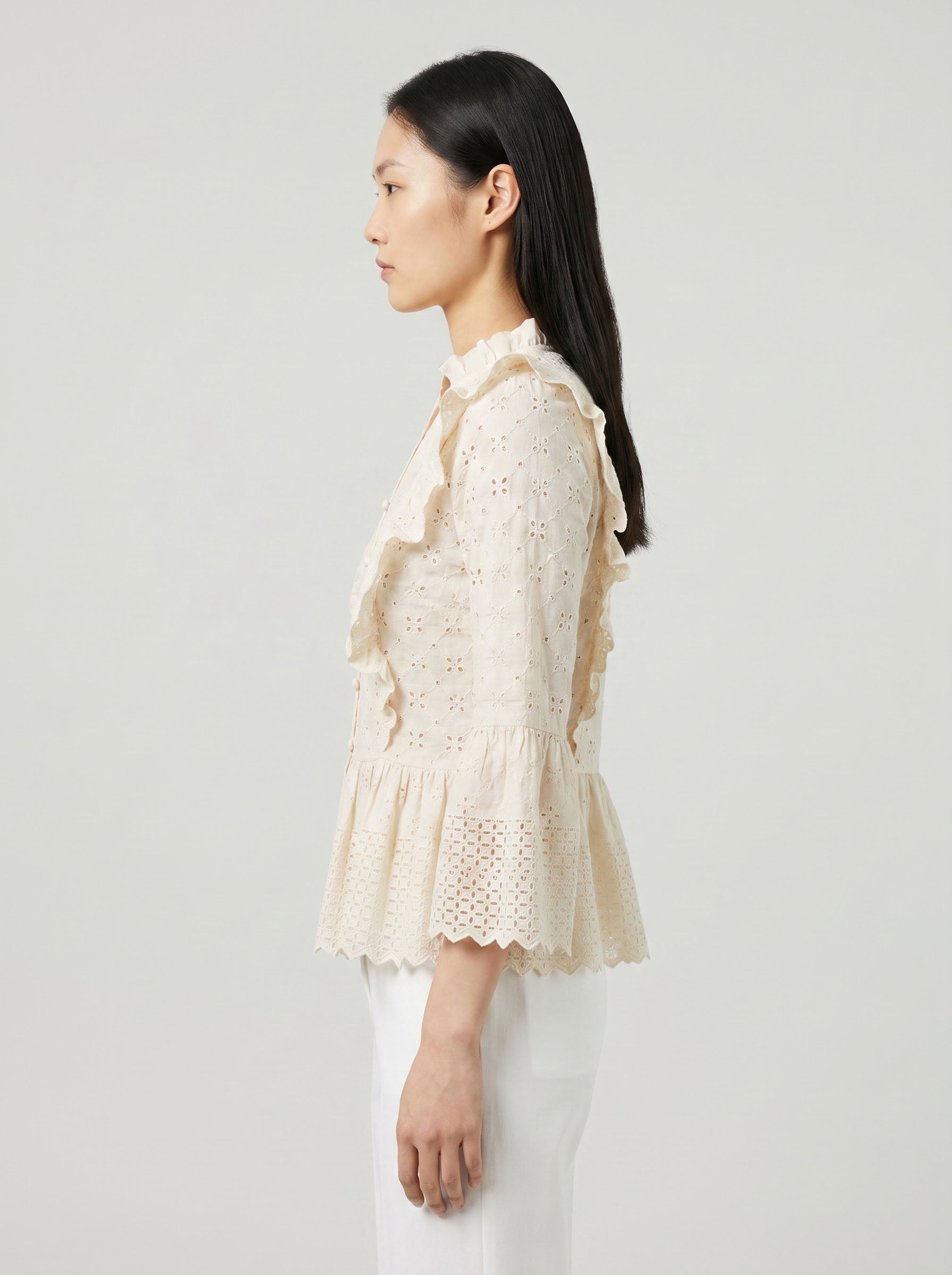 Women Cream Schiffli Embroidered Peplum Top with Ruffle Detail